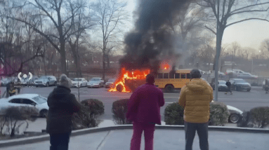 A video posted to social media shows a school bus that erupted into flames on Allerton Avenue Monday morning.